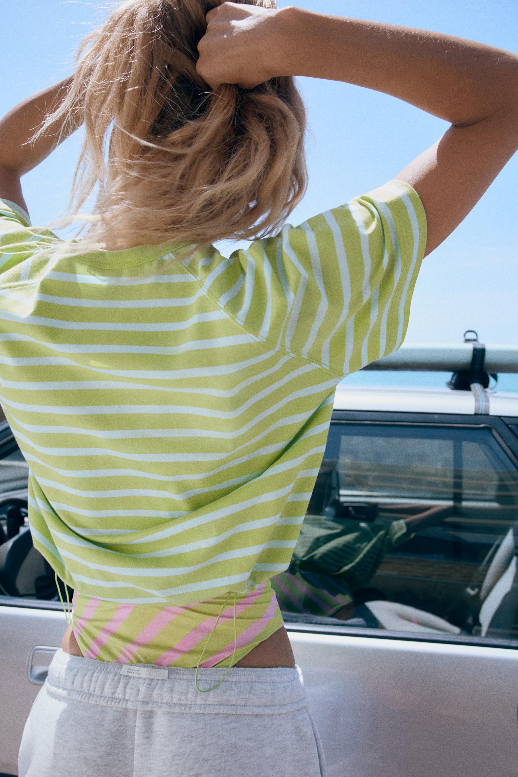 STRIPED T-SHIRT WITH STOPPERS